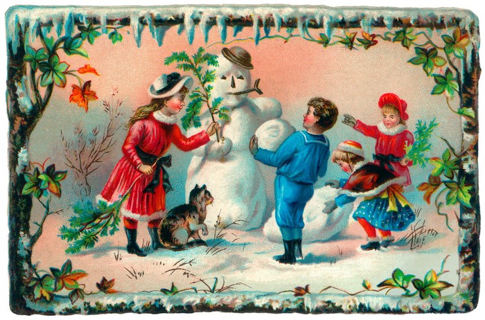 Children building a snowman with a cat