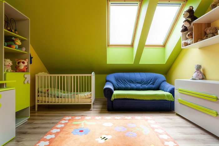 Children's bedroom with crib and sofa