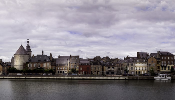 Givet, France Riverfront with Church and Houses