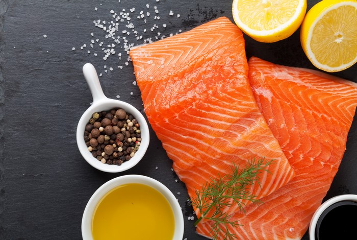 Salmon fillets with lemons, spices, and olive oil
