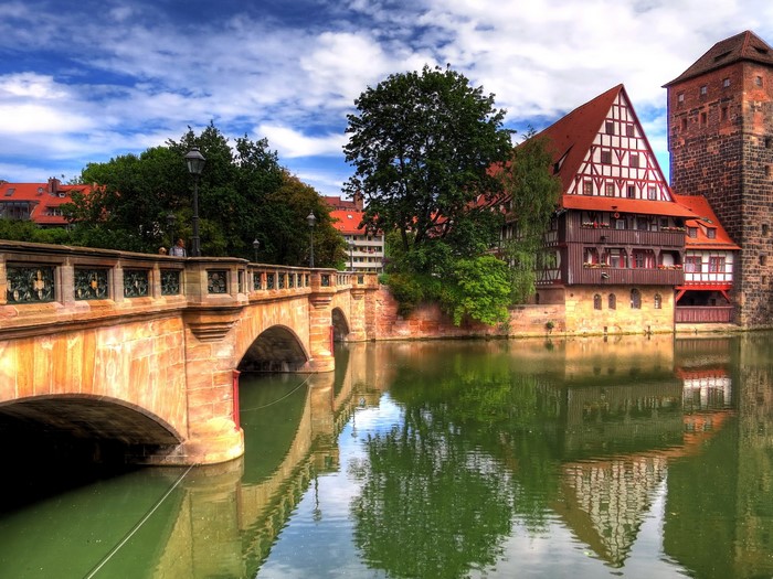 Half-timbered houses and bridge over river in Nuremberg, Germany