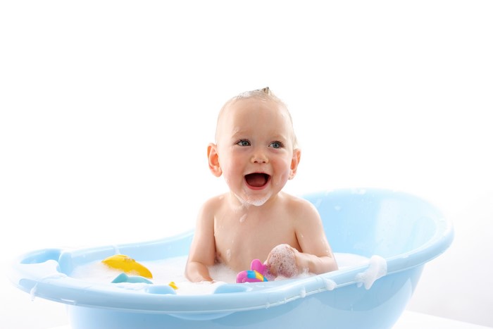 Baby in Bathtub with Toys