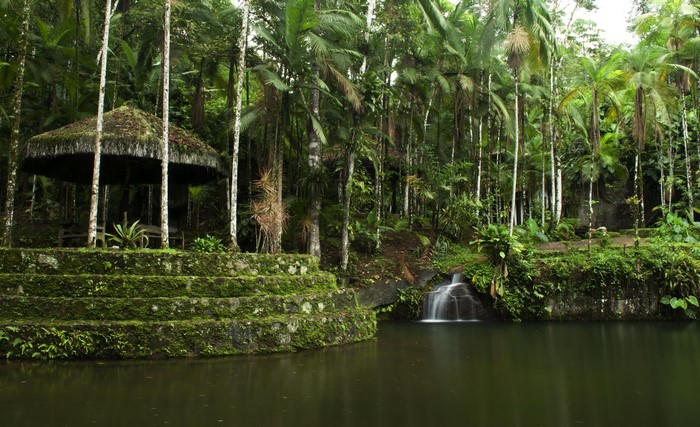 Gazebo by waterfall in tropical forest, Paraty, Brazil