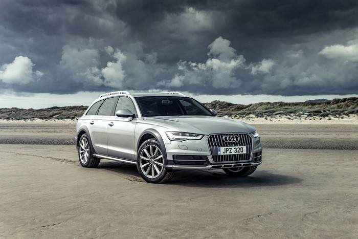 Silver Audi A6 Allroad Sport on a Beach