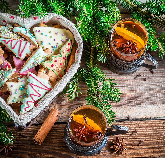 Christmas cookies and mulled wine with fir branches