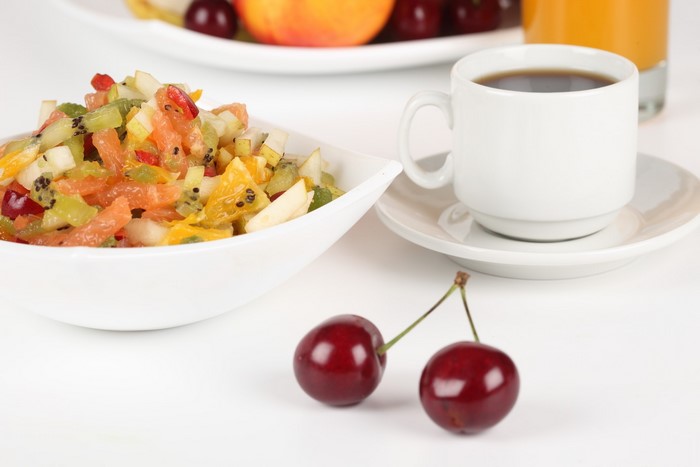 Fruit salad with coffee and cherries