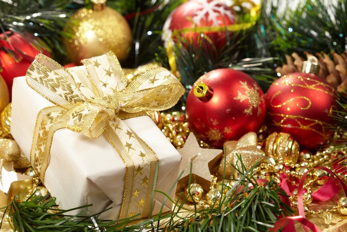Christmas gift with ornaments and pine cones