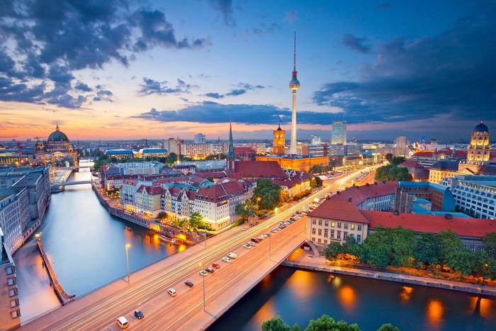 Berlin cityscape with Spree River and TV Tower at dusk