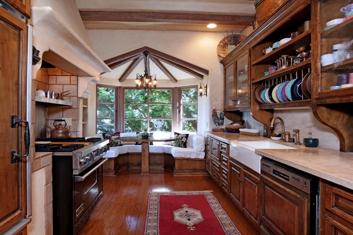 Kitchen with Chandelier and Carpet