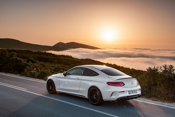 White Mercedes-Benz AMG C63 S Coupe at Sunset