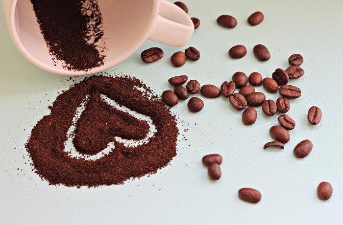 Coffee beans and grounds in a heart shape