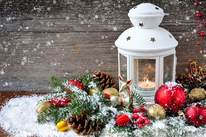 Christmas lantern with pine cones and ornaments