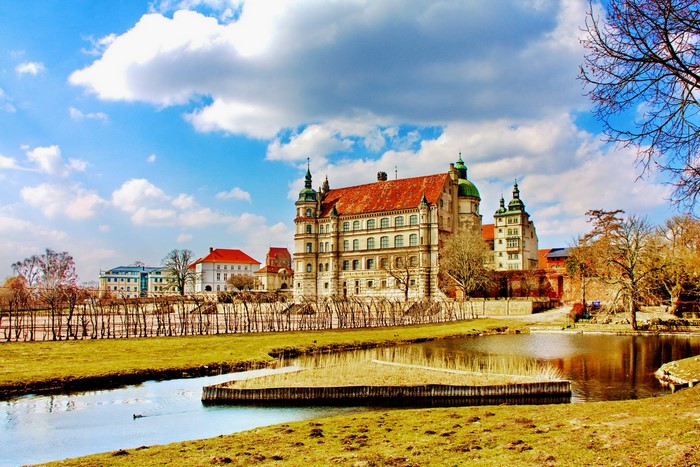Schwerin Castle with pond and gardens, Germany
