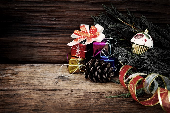 Christmas Gifts and Ornaments on Wooden Surface
