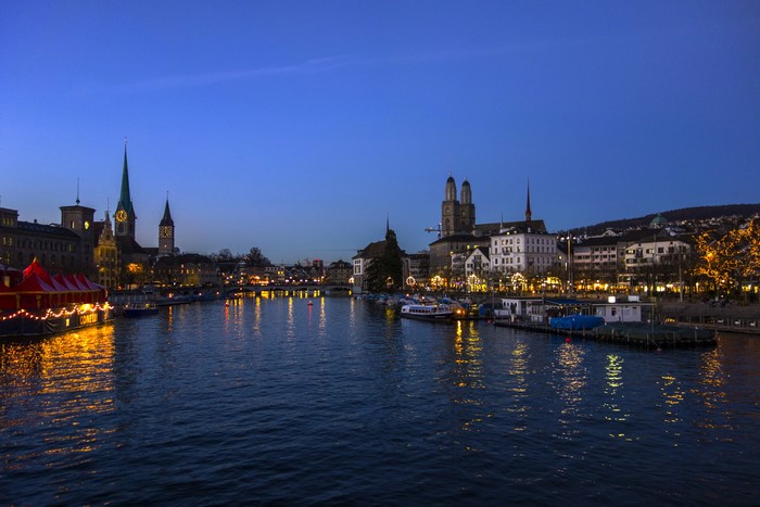 Zurich skyline at night with Limmat river