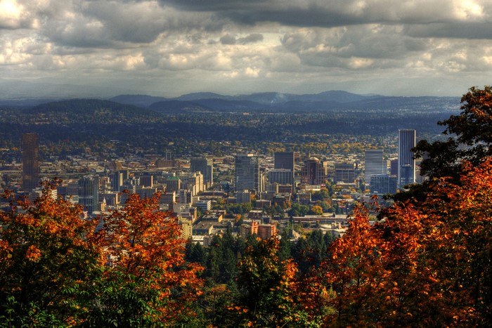 Portland cityscape in autumn with mountains and clouds