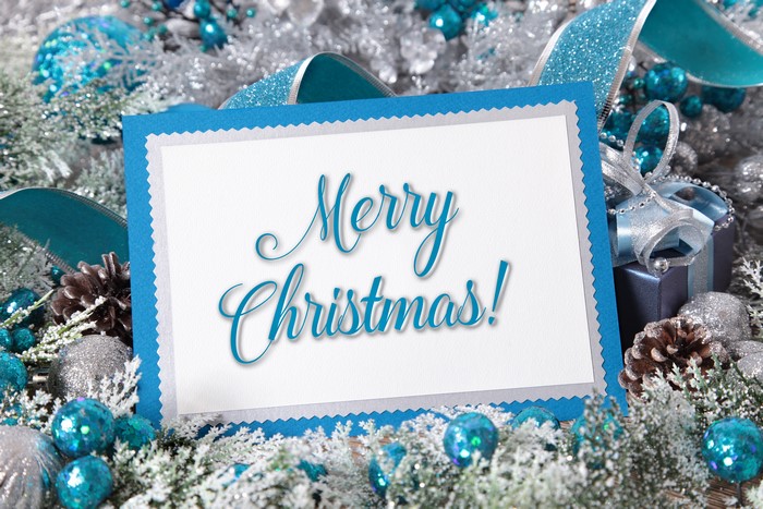 Merry Christmas card with blue and silver decorations