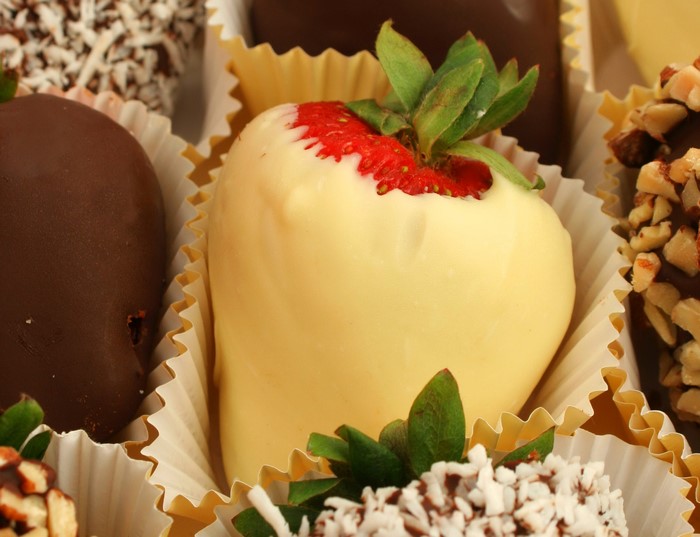 Chocolate covered strawberries with toppings