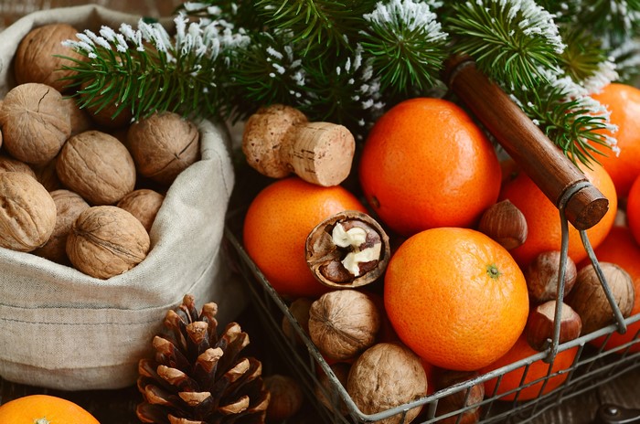 Christmas Mandarins and Nuts with Pine Cone and Fir Branches