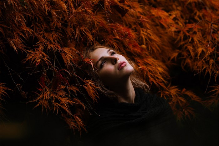 Woman in foliage