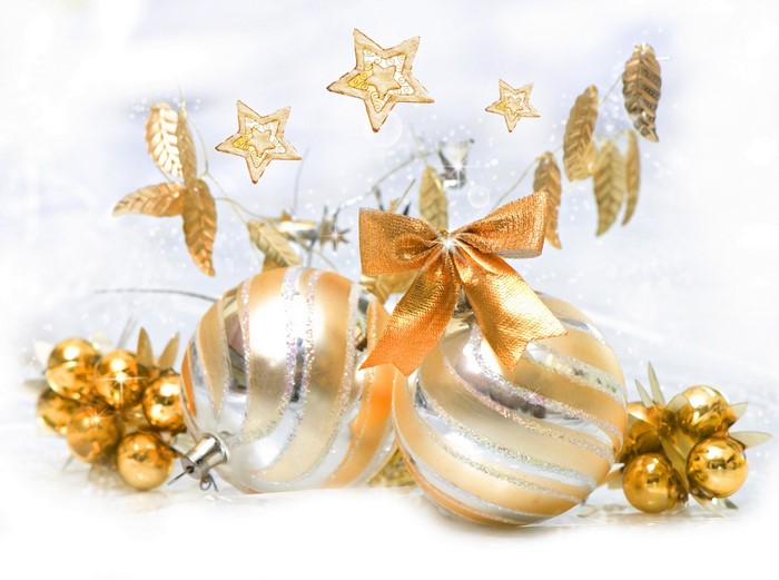 Gold and silver Christmas ornaments with stars and leaves