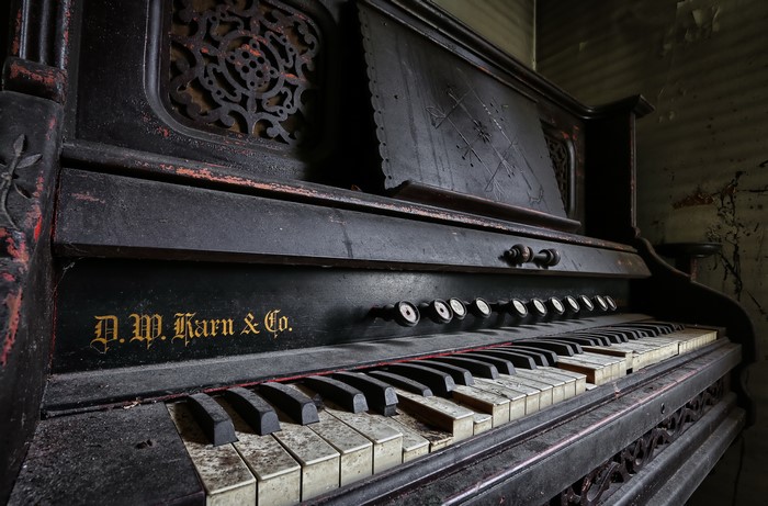 Close-up of an antique D.W. Karn & Co. piano