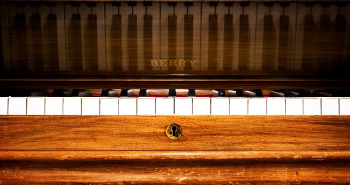 Berry upright piano keys and lock