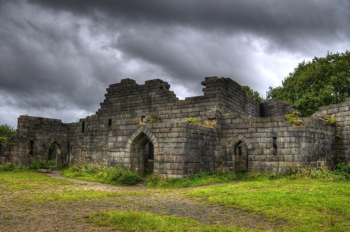 Ruins of Liverpool Castle in England under a cloudy sky