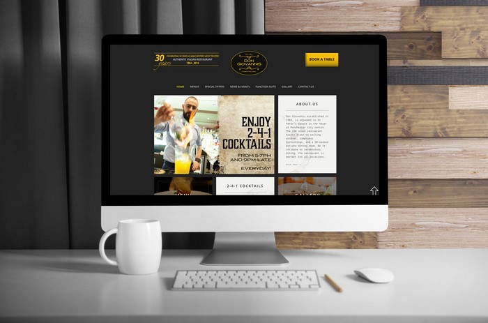 Don Giovannis restaurant website on an Apple iMac