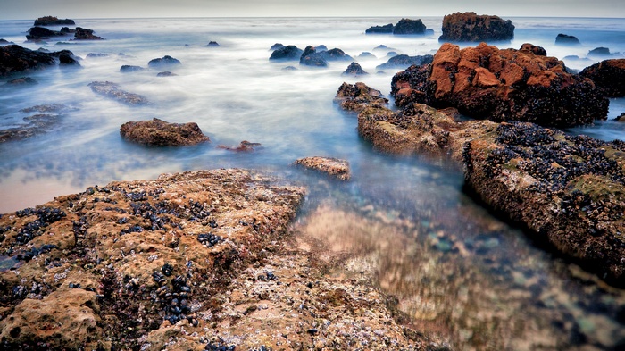 Rocky coastline with waves crashing