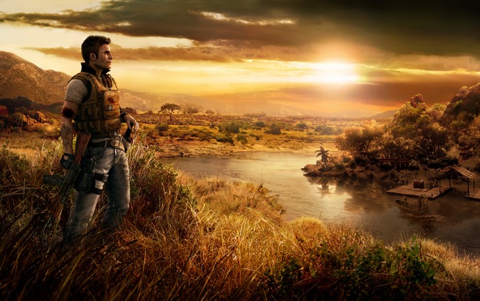 Man with gun in African landscape at sunrise