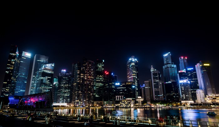Singapore skyscrapers at night over the river