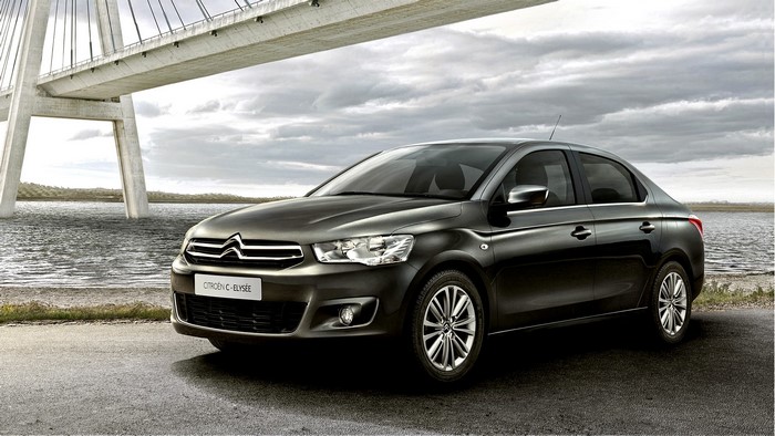 Citroen C-Elysee sedan by a bridge