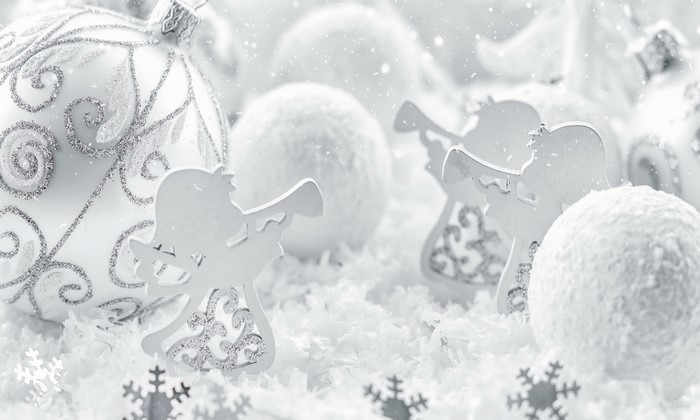 Christmas ornaments and angels in snow