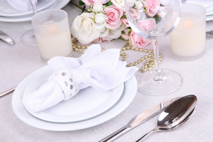 Table setting with candles and flowers
