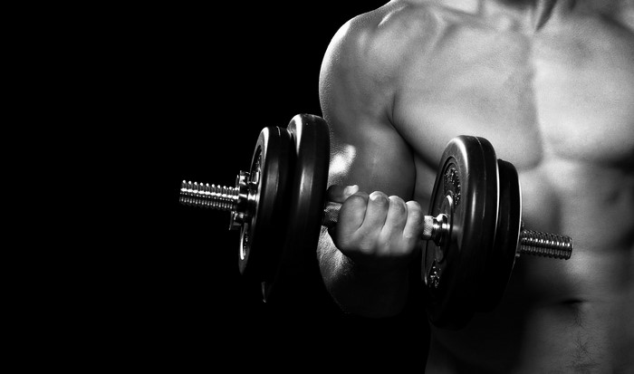 Man lifting dumbbell