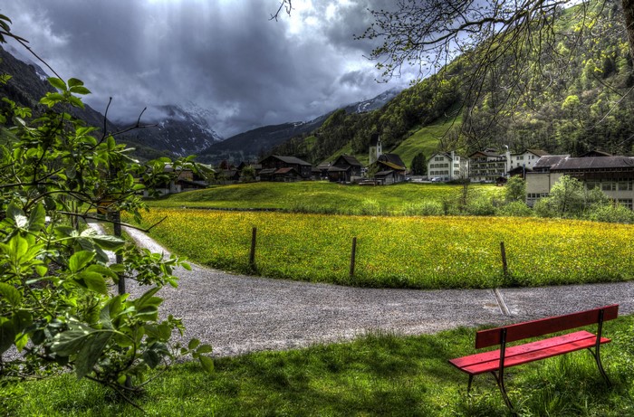 4K Switzerland Village with Mountains and Meadow
