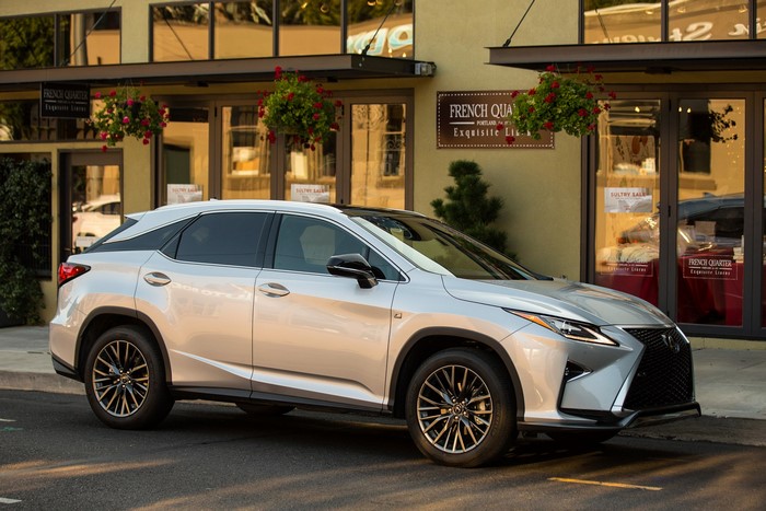 Silver 2016 Lexus RX 350 F-Sport parked outside French Quarter