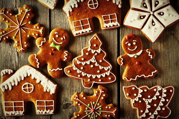 Christmas gingerbread cookies on wooden background
