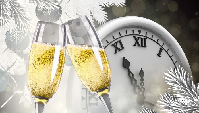 Champagne glasses and clock for New Year's Eve