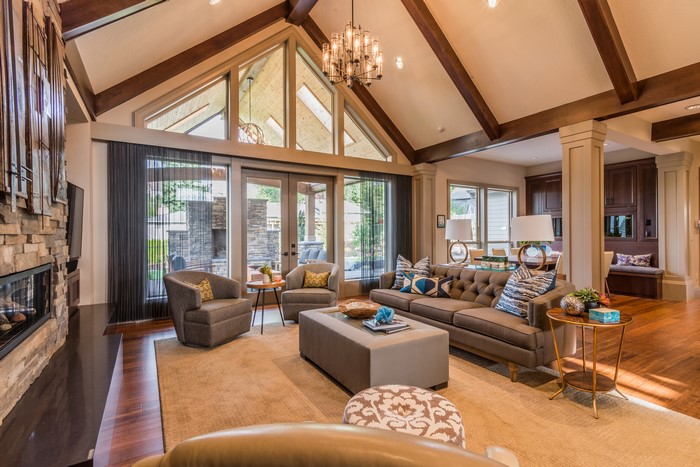 Living room with vaulted ceiling and chandelier