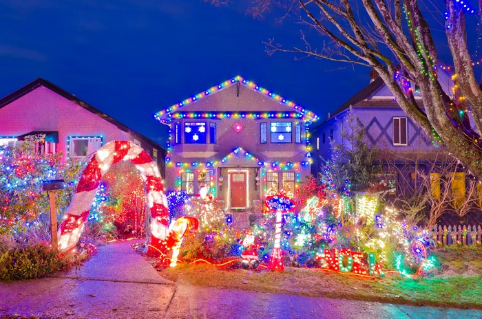 Houses decorated with Christmas fairy lights