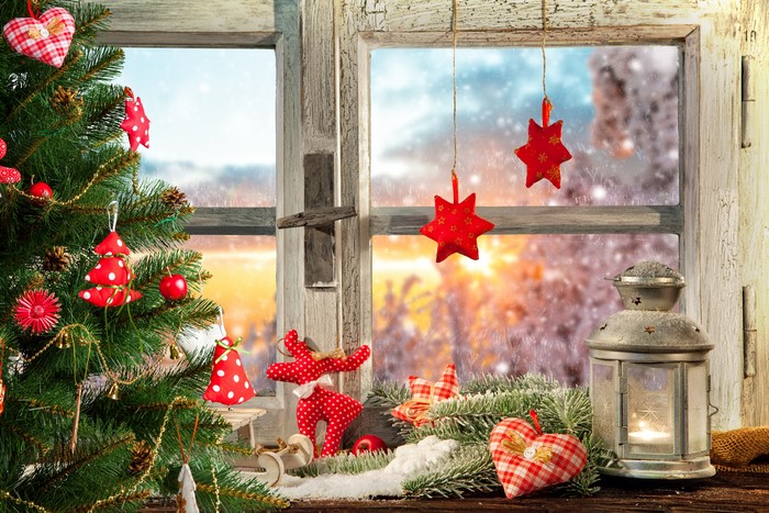 Christmas window with tree and lantern