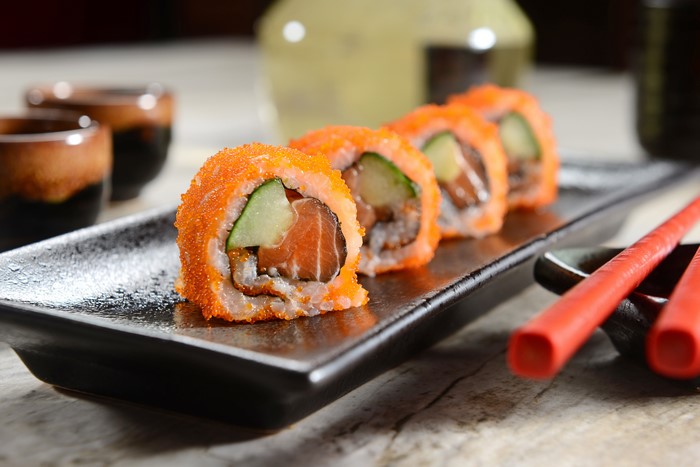 Sushi rolls with salmon and cucumber