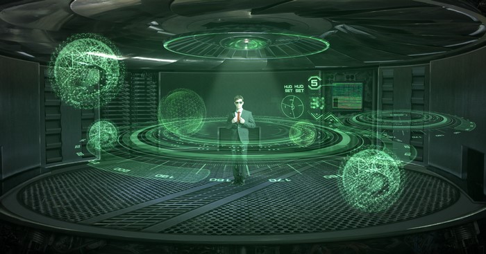 Man in futuristic control room with holograms