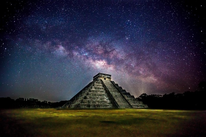 Chichen Itza Pyramid under the Milky Way in Mexico