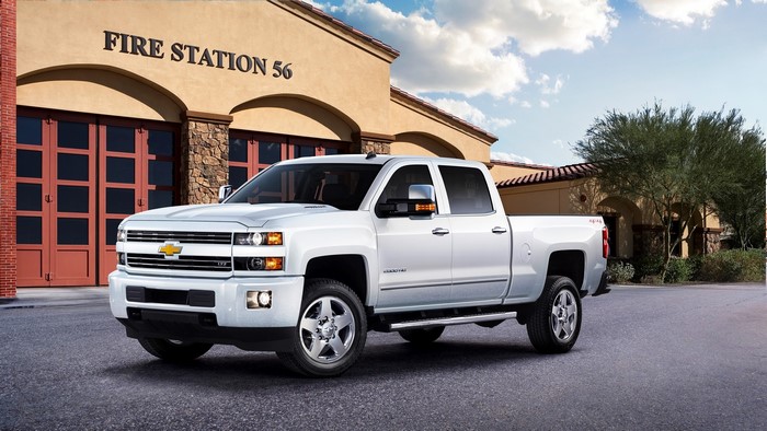 White Chevrolet Silverado 2500 LTZ Truck at Fire Station