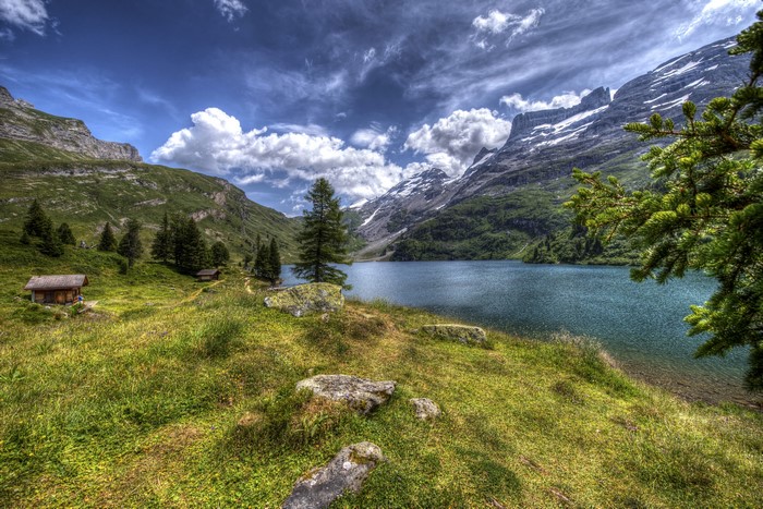 Engstlensee Lake with Mountains and Cabins in Switzerland
