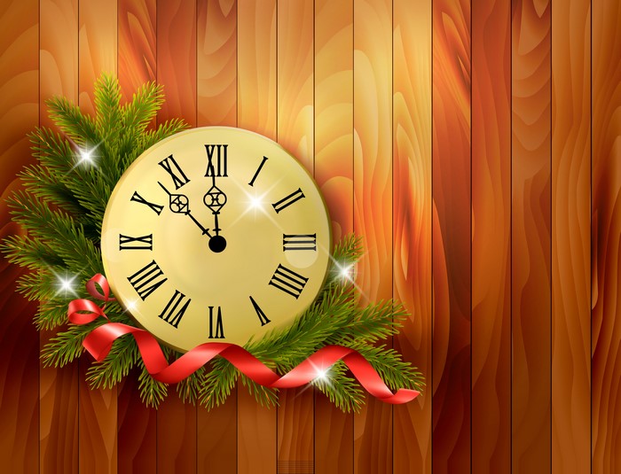 Christmas Clock with Pine Branches and Ribbon on Wood