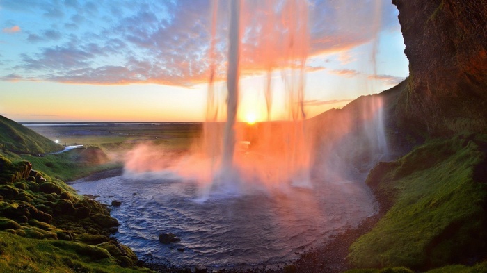 Seljalandsfoss waterfall at sunset in Iceland